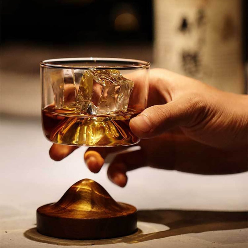 Mountain-shaped wooden bottom glass